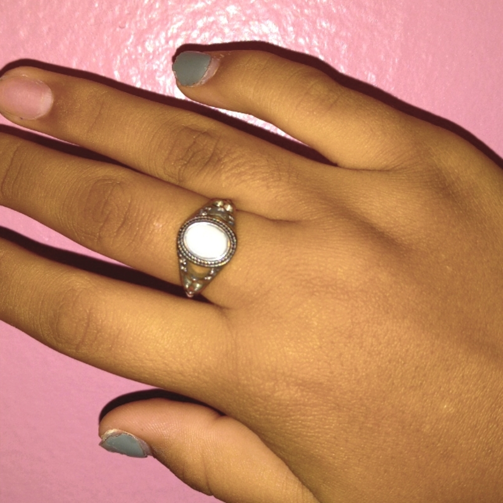 Ring with cream colored rock